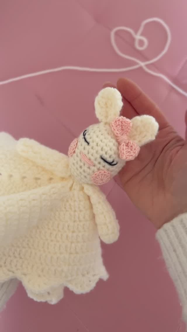 Cream crochet lovey with a little bunny