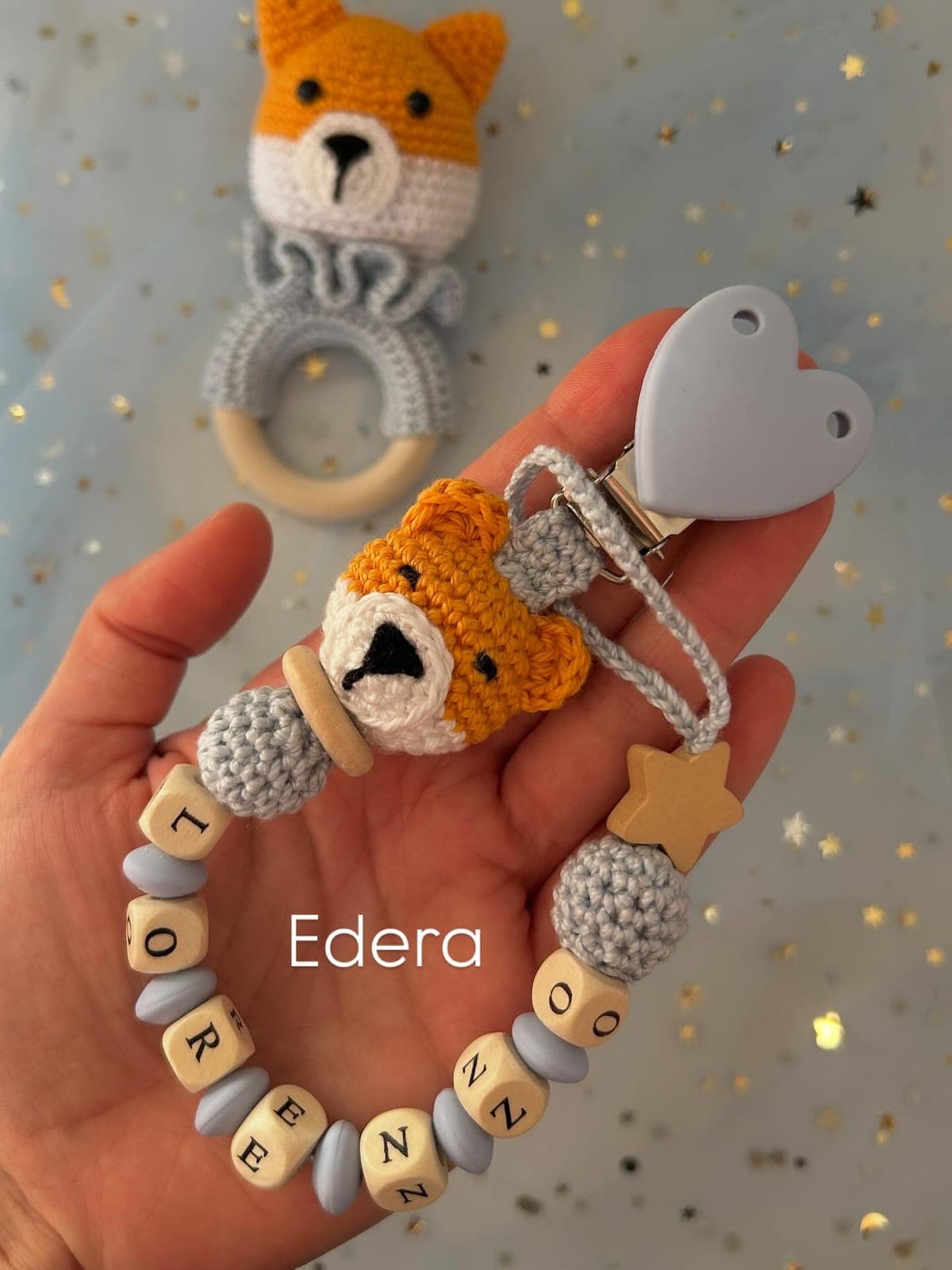 Pacifier clip with a crochet fox and the baby's name, with a matching rattle