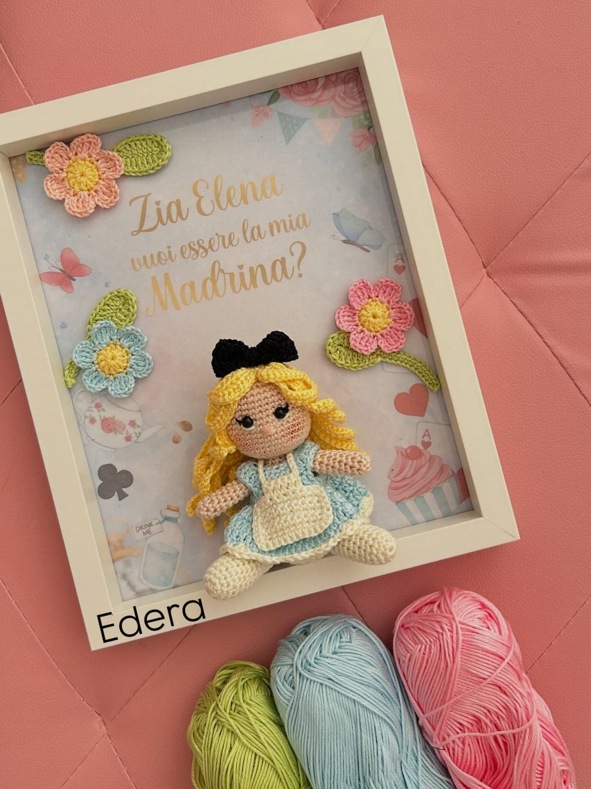 Godmother proposal frame with a crochet doll and colourful flowers